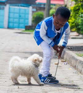 Little boy with pet dog